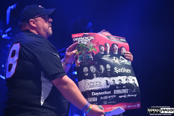 Big Rig & AJ with all band signed poster for giveaway